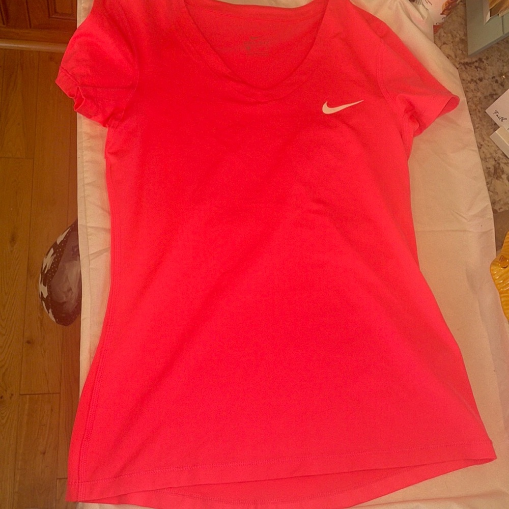 Nike dri fit shirt, size medium bright pink